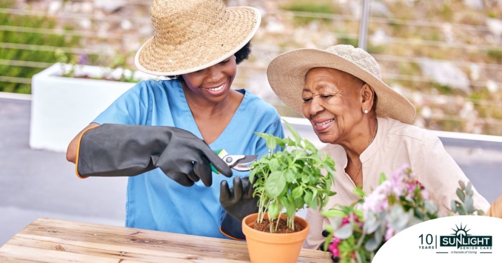 Caregiver and Senior gardening as part of companion care activities.