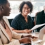 A couple talks with and advisor, representing the type of preparation that is crucial for successful senior care planning.
